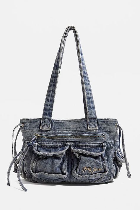 https://www.urbanoutfitters.com/en-gb/shop/bdg-lissy-denim-y2k-shoulder-bag Y2k Bags, Y2k Shoulder Bag, Jean Purse, Y2k Accessories, Urban Outfitters Jeans, Denim Handbags, Bdg Jeans, Denim Shoulder Bags, Jeans Bag