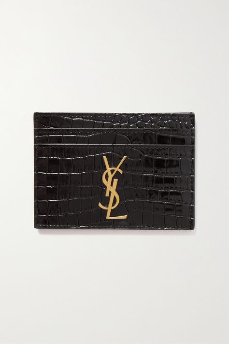 SAINT LAURENT's cardholder has a slim silhouette that's perfect for slipping into even the smallest clutches or bags. Made in Italy from croc-effect leather, it has four card slots and a center pocket and is embellished with the label's gold-tone 'YSL' plaque. Black Wishlist, Ysl Cardholder, Ysl Card Holder, Ysl Wallet, Luxury Bags Collection, Leather Cardholder, Fancy Bags, Small Clutch, Designer Wallets