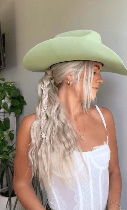 Hat Hair, Don't Care: Cute Hairstyles to Pair with Your Cowboy Hat - COWGIRL Magazine Curly Hair Cowboy Hat, Hairstyle With Hat, Cute Hat Hairstyles, Cowgirls Hairstyles, Cowgirl Hair, Cowgirl Magazine, Hat Hair, Cute Hat, Cowgirl Hats