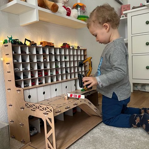 Here is the garage for tiny toy cars. Unpainted variation but still with road markings. Personalizable https://etsy.me/3o7IHlj Toy Car Wash, Toddler Play Table, Toy Car Display, Car Play Mats, Toy Car Garage, Toy Car Storage, Toy Garage, Toddler Boy Gifts, Toy Cars