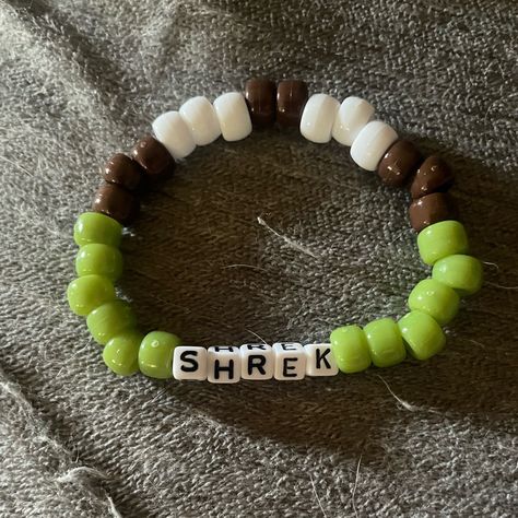 Handmade Kandi X Base Cuff, Alvin And The Chipmunks Bracelet, Mf Doom Bracelet, Kandi Bead Animals, Beaded Jewelry Green, Shrek Kandi, Shrek Bracelet, Billie Eilish Inspired Bracelet, Words To Put On Kandi