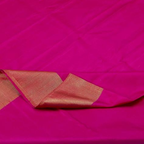 Sarangi Handwoven Kanjivaram Silk Sari 1050129961  View the full sari : https://bit.ly/2my4oIt ~~~~~~~~~~ Lustrous rani pink stirred with a generous helping of magenta lends the body of this sari a rich fuchsia colour. The wide gold border exudes a textured feel and acquires a burnished tinge as it mirrors the rich magenta pink. The pink pallu is a sheath of shimmering gold, gently dissipating into slender gold stripes. ~~~~~~~~~~ View stunning saris in this colour: http://amp.gs/7UpD Subscribe: http://amp.gs/7UpJ #sarangisotd  #silksaree #handloomindia #sarangithestore Rani Pink, Gold Border, Magenta Pink, Silk Sari, Fuchsia Color, Saree Look, Gold Stripes, Hand Loom, The Pink