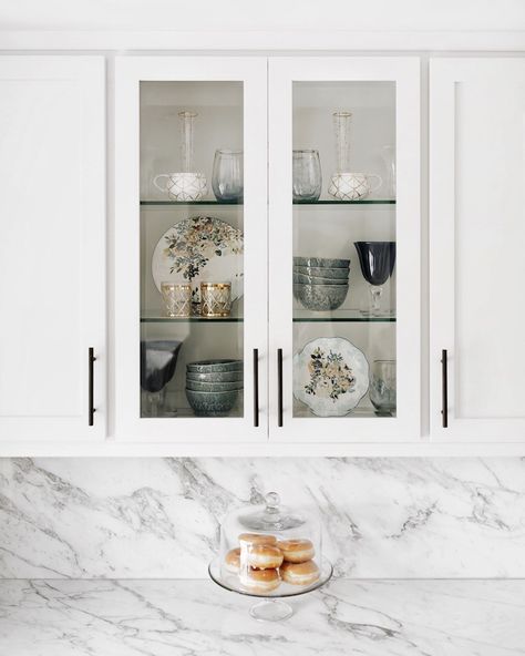 Styling kitchen shelves | My Style Diaries blogger Nikki Prendergast. Matte black cabinet hardware bar pulls by Emtek. Decorating Upper Glass Kitchen Cabinets, Glass Kitchen Shelves, Style Glass Kitchen Cabinets, Glass Kitchen Cabinets Decor, Glass Upper Kitchen Cabinets, Styling Kitchen Shelves, Kitchen Glass Cabinet, Kitchen Glass Cabinets, Kitchen Cabinet Display