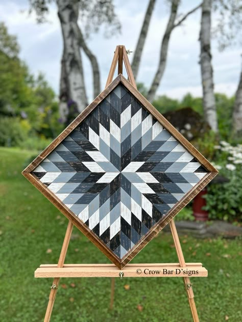 This pretty and dramatic wooden barn quilt features a spiraling star pattern in gray tones.  This is perfect for adding eye-catching appeal to your entryway, living room, or bedroom.  It can also be hung outside on a covered porch or patio setting. Rustic Wood Wall Art - Barn Quilt - Spiral * Measures 25" x 25" (diagonal) or 17 3/4" x 17 3/4" (square) * Hand painted in white, gray, and black colors * Wood Framing * Metal hangers on back for easy wall hanging * Ready to ship in 1-3 business days *Free Shipping USPS Priority Mail This handmade wood wall art is created with premium cedar that is locally sourced here in Vermont.  Each wood cutout of the inlaid geometric design is hand painted and lightly distressed to give the piece a rustic charm and a vintage vibe.  It is framed and finished Wood Lath Art, Wood Quilt Wall Art, Wooden Quilt, Southwestern Wall Art, Geometric Wood Wall Art, Wood Quilt, Geometric Wood Wall, Rustic Wood Wall Art, Gradient Art