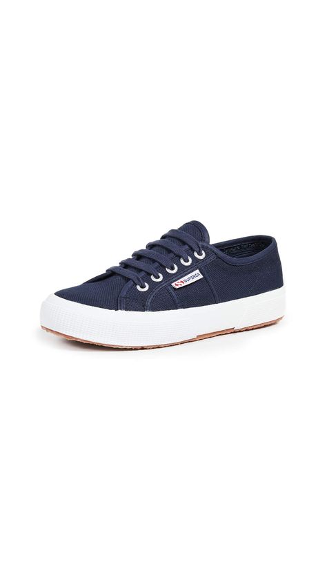 PRICES MAY VARY. Fully breathable pure cotton Style may feature 5 or 6 eyelets Sneaker featuring lace-up vamp with silver-tone rivets and wrap-around outsole Logo tag at side;Vulcanised gum sole Superga sneakers tend to run slightly large. We recommend sizing down by 1/2 size. Fit tip-we recommend a whole size down from the size you usually take Superga Cotu, Superga Sneakers, Superga Shoes, Fabric Canvas, Lace Up Sneakers, Flat Sneakers, Classic Sneakers, Trainers Women, Spring Shoes