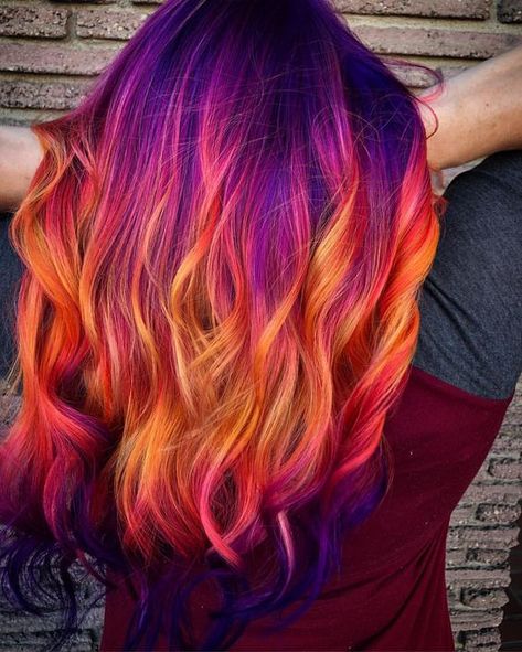 33+ Drop-Dead Beautiful Sunset Hair Styles that Will Turn Heads 3 Red Purple And Blonde Hair, Sunset Hair Color Peek A Boo, Purple Halloween Hair, Short Fun Colored Hair, Fire Colored Hair, Bright Summer Hair Color, Fire Hair Color Short, Danger Jones Hair Color, Unusual Hair Colours