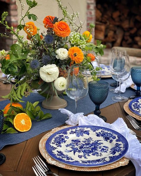 Blue Citrus Wedding, White Orange Blue Wedding Bouquet, Chinoiserie And Citrus Wedding, Blue Orange Floral Arrangement, Tangerine And Blue Wedding, Orange Blue And White Wedding, Green And Orange Tablescape, Blue And Orange Aesthetic Wedding, Blue Green And Orange Wedding