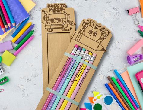 Get ready for the school year with our Back-to-School Personalized Pencil Holders, perfect for your children and grandchildren or even someone that needs some encouragement! Crafted from beautiful natural wood and engraved with cute school designs (two of them can be personalized), these holders are a delightful way to keep their desks organized and inspiring. They make wonderful gifts that bring a touch encouragement to their daily routines. Our Back-To-School bus and Apple Pencil can be personalized. You can also personalize the inside of the holder. They measure approximately 2.5 x 10.7 inches and can hold up to 6 pencils. Order yours today and send them off to school with a reminder how much you love them! Recommended for Indoor Use Only. We ship within 3-5 business days. This does not Personalized School Supplies, School Designs, Off To School, Pencil Holders, Abstract Art Diy, School Pencils, Personalized Pencils, You Are Special, Daily Routines