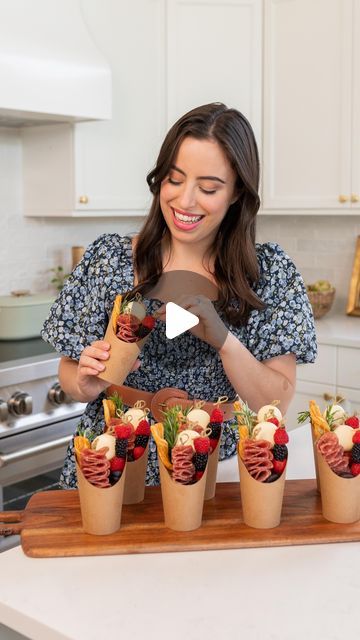 Carolina de Mauro on Instagram: "CHARCUTERIE CUPS ✨ your next party appetizer!  These cups are so cute and this is the easiest and most beautiful snack for your event. You can create them with whatever ingredients you prefer, but for ours we used:  - Trader Joe’s Fig & Olive Crackers - Salami - Babybel Cheese + Cherry Tomatoes - Trader Joe’s Peanut Butter Dark Chocolate Cups - Berries - Cheesesticks - Rosemary to decorate  Comment LINKS and I’ll DM the links to shop everything we used!  #founditonamazon #charcuterieboard #easyappetizers #appetizers #fallrecipes #entertainingathome #entertainingideas #entertaininginstyle #fallrecipe #bridalshowerideas #Itkhome #babyshoweridea #charcuteriecups #amazonfinds #amazonmusthaves #theeverygirlathome #snackboard #creativerecipes #pinterestinspired" Babybel Cheese Charcuterie, Make Your Own Charcuterie Cups, Breakfast Charcuterie Cups, Charcuterie Cups Diy, Christmas Charcuterie Cups, Olive Crackers, Diy Charcuterie Cups, Charcuterie Cups Ideas, Salami Appetizer