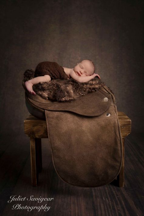 Newborn baby boy sleeping on saddle. Photo Shoot At Home, Toddler Photoshoot, Newborn Photo Shoot, Toddler Photos, Family Photo Shoot, Newborn Baby Photography, Newborn Photoshoot, Baby Family, West London