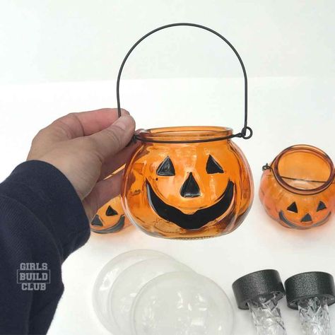 Halloween Pumpkin Solar Light Decor- Dollar Store DIY - Girls Build Club Solar Pumpkin Lantern, Solar Light Halloween Decorations, Diy Halloween Solar Lights, Dollar Tree Solar Light Crafts, Pumpkin Solar Lights Diy, Dollar Tree Solar Lights Diy Projects, Halloween Solar Lights, Diy Resin Coasters, Halloween Luminaries