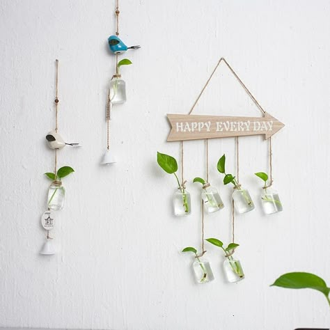 Glass Bottle Wall Decor, Hanging Bottles Decoration, Small Bottle Crafts, Small Glass Bottle Crafts, Glass Bottle Wall, Wall Hanging Plants, Plants In Bottles, نباتات منزلية, Small Glass Bottles