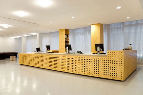 Library Interior Design in University of Amsterdam Library Interior Design, Info Desk, University Of Amsterdam, School Reception, Library Desk, Library Interior, Reception Desk Design, Library Furniture, Hallway Design