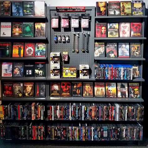 Movie Shelf Aesthetic, Horror Movie Shelf, Horror Movie Theater Room, Movie Collection Display, Hot Wheels Wall Art, Comic Shelf, Dvd Wall, Movie Shelf, Diy Dvd Storage