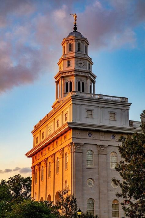 "For a limited time this art is 50% off - the prices shown are the sale price - no promo code needed. FREE Shipping on order over $35 THE KNOT THAT TIES by F.S. Christiansen captures the Nauvoo temple in as the sun sets, showcasing the beauty that comes after a long day. In many ways, the Nauvoo temple functions as Bruce C. Hafen said, \"The earth temple [is] in the middle of everything...around which all heavenly motions revolve, the knot that ties earth and heaven together.'\" This art is beau Nauvoo Temple, Lds Temple Art, Lds Church History, Saint Art, Angel Moroni, Lds Temple Pictures, Mormon Art, Temple Pictures, Lds Art