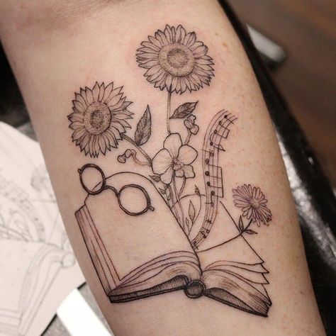 Tattoos With Books And Music, Books And Music Tattoo Ideas, English Major Tattoo Ideas, Book With Music Notes Tattoo, Book Hip Tattoo, Book And Music Tattoo Ideas, Tree And Book Tattoo, Book Music Tattoo, Book And Sunflower Tattoo