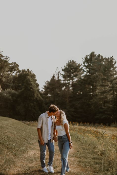 Engagement photo Couple Photoshoot Poses Engagement, Engagement Photos Vision Board, Beach Engagement Photos Outfit Jeans, Couples Outfits Photoshoot, Similar Height Couples, Jeans And T Shirt Engagement Photos, Post Engagement Photoshoot, Engagement Photos Willow Tree, Hill Country Engagement Photos