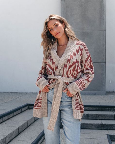 Add a touch of style and warmth to your wardrobe with our Taupe Aztec Belted Cardigan! Made with 100% polyester, this cardigan features a classic collared neckline, an eye-catching Aztec print, and a self-tie belt for a flattering fit. Perfect for any occasion! Layer it over a basic tank top and pair with jeans, ankle booties, and mixed accessories for an everyday comfy fall outfit! Western Cardigan, Sorority Rush Outfits, Longline Sweater, Rush Outfits, Comfy Fall Outfits, Trendy Outfit Ideas, Gameday Dress, Loungewear Dresses, Casual White Dress