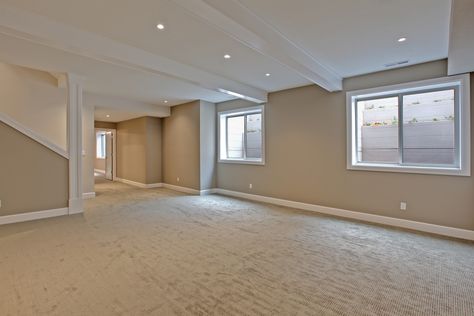 Finished daylight basement with carpet, Lake Oswego, Oregon - Contemporary - Basement - by Lifestyle Homes | Houzz Big Basement Windows, Daylight Windows Basement, Basement With Carpet, Daylight Basement Ideas, Deep Spring, Daylight Basement, Contemporary Basement, Lake Oswego Oregon, Three Story House