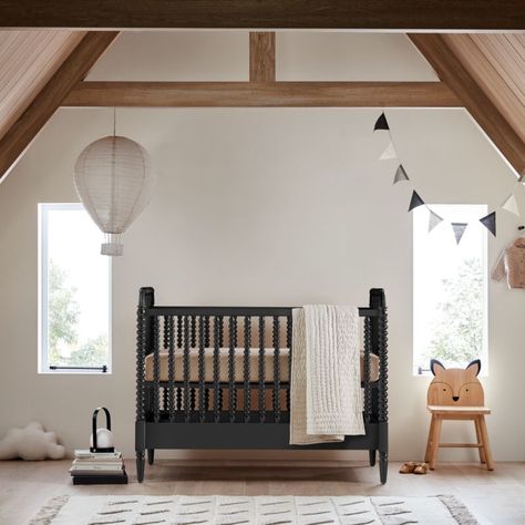 A bestseller for a reason, our Jenny Lind Black Crib is a timeless piece for the nursery. The iconic collection, with its intricate wood turnings, has been made in the same location with the same classic design for more than 20 years-but its modern sensibility means it hasn't aged a day. Each spindle is made from a single piece of wood, then hand-sanded to capture every gorgeous detail. The Jenny Lind crib seamlessly grows with your little one thanks to the easy-to-assemble Jenny Lind Toddler Be Black And Cognac Nursery, Neutral Nursery With Black Crib, Black Iron Crib Nursery, Jenny Lind Black Crib, Black Crib Nursery Ideas, Nursery With Black Crib, Black Crib Nursery, Jenny Lind Toddler Bed, Jenny Lind Crib