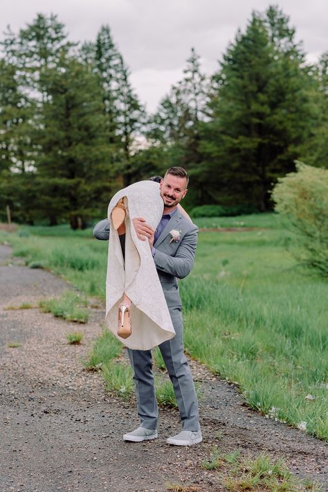 groom carrying bride over shoulder in wedding attire Over The Shoulder Carry Couple, Groom Carrying Bride Over Shoulder, Carried Over Shoulder Couple, Bridal Carry, Groom Carrying Bride, Island Park Idaho, Lavender Shirt, Jackson Hole Wedding, Outdoor Elopement