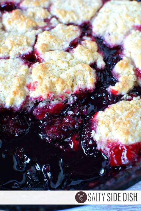 Blackberry cobbler with fresh blackberries and a homemade biscuits topped with course sugar, is a delicious dessert that takes the place of pie in a pinch. Cobbler is super holiday friendly and often served as a fall dessert. You won’t believe how easy it is to make the best blackberry cobbler ever so let’s getContinue Reading Southern Blackberry Cobbler, Easy Blackberry Cobbler, Raspberry Cobbler, Salty Side Dish, Strawberry Angel Food Cake, Peach Cobbler Dump Cake, Blackberry Cobbler Recipe, Cobbler Recipes Easy, Blueberry Dump Cakes