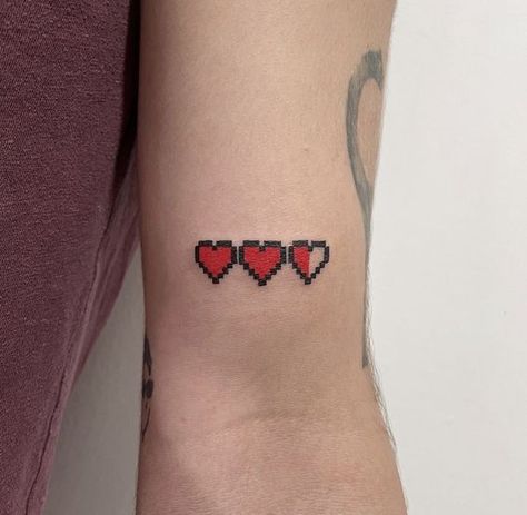 Discover 18 Unique Three Hearts Tattoo Designs for 2024: Inspiration for Symbolic Ink Art - Explore Now! Pixel Heart Tattoo, Three Hearts Tattoo, Minecraft Tattoo, Pixel Tattoo, Nintendo Tattoo, Hearts Tattoo, Zelda Tattoo, Gamer Tattoos, Minimalist Tattoo Ideas