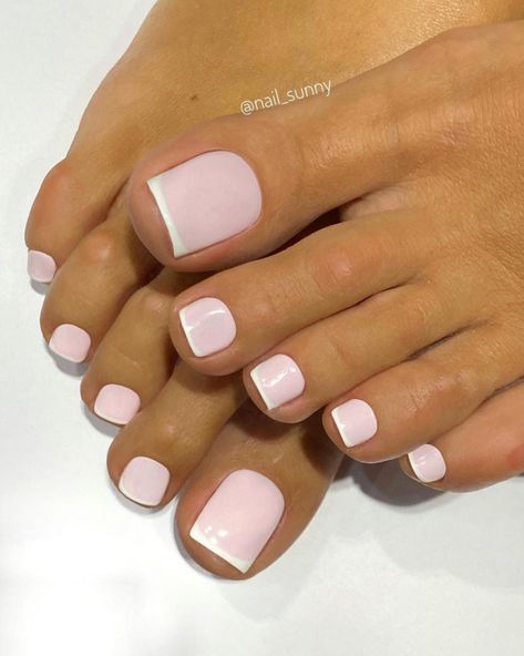 33. French Soft Pink Pedicure Most of us have more attention to our fingertips, and forget about our toes. Your fingernails shouldn’t get to... Classy Manicure And Pedicure, Simple French Pedicure, Fingernail Designs Summer French Tips, Pink White Pedicure, June Toe Nail Color, Pedicure Ideas Spring 2023, Pink And White Pedicure Toenails, Pedicure Colors Fall 2022, Wedding Pedicure Ideas Bridesmaid