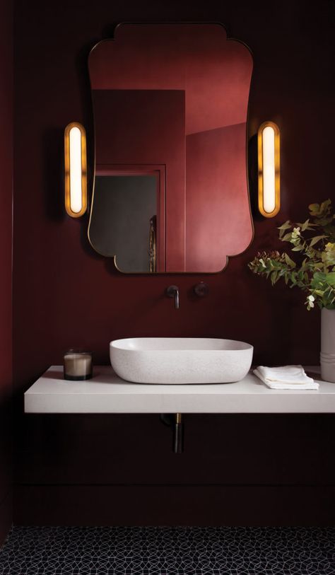 This deep-red powder bathroom has a cantilevered countertop and concrete vessel sink. Marble Bathroom Shower Tile, Black Powder Room Ideas, Powder Room Modern, Black Powder Room, Green Bathroom Ideas, Contemporary Powder Room, Modern Powder Rooms, Red Bathroom Decor, Half Bathroom Decor