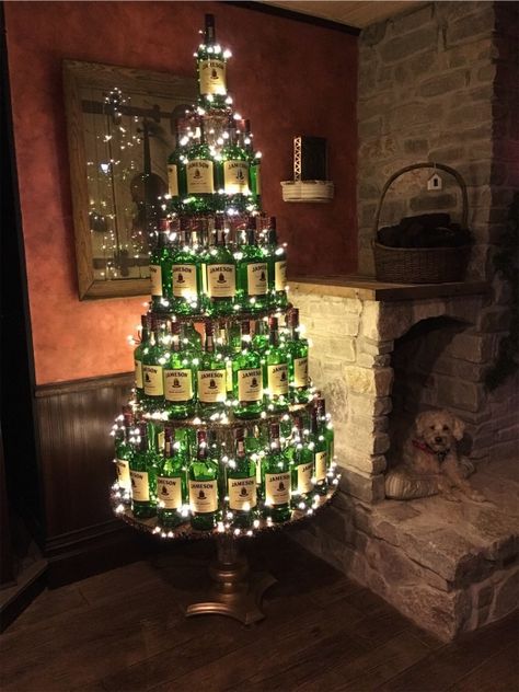 VSCO - Our Jameson Irish Whiskey bottle christmas tree in our Ould Sod Pub!!!!!! Feature our Irish Lucky dog!!!! | katefitz51 Christmas Tree For Cabin, Irish Pub Christmas Decor, Christmas Decorations Bar Restaurant, Irish Pub Decor Ideas, Irish Christmas Tree, Pub Christmas Decor, Christmas Pub Decorations, Pub Christmas Decorations, Beer Christmas Tree