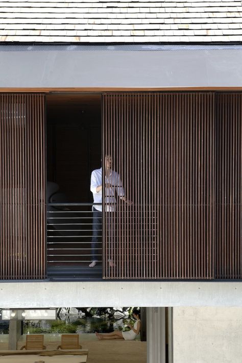 The Courtyard House,© Albert Lim Formwerkz Architects, Timber Screen, Sliding Shutters, Timber Screens, Casa Patio, Timber Cladding, The Courtyard, Commercial Architecture, Courtyard House