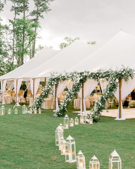 A beautiful April day spent flowering for the new Mr. and Mrs. Markwalter 🤍 #designsbydillon Pole Tent Wedding, Tent Entrance, Lantern Pathway, Greenery Ceremony, Tent Wedding Reception, Reception Bar, Pink And White Weddings, Garden Estate, Classic Wedding Decorations