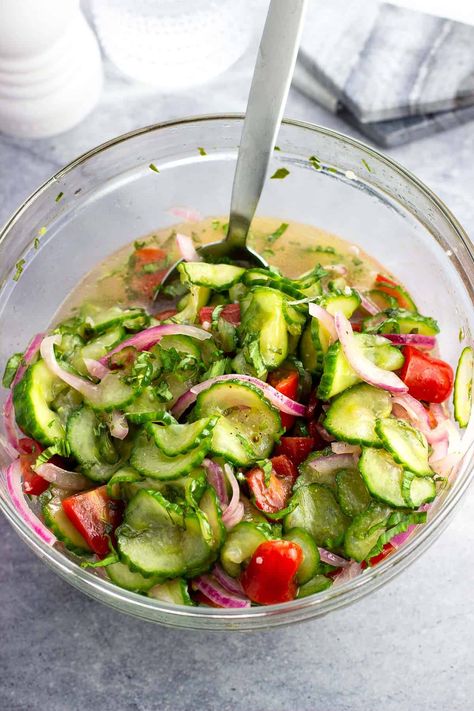 This cucumber, tomato, and onion salad is marinated for hours (ideally overnight!) to develop the BEST bold flavor that only gets better with time. A few simple tricks along the way ensure you get a balance of seasoned tang and sweetness. It's a perfect make-ahead salad for warm weather get-togethers. Tomato Onion Cucumber Salad, Tomato Onion Recipe, Marinated Cucumbers Onions And Tomatoes, 24 Hour Salad, Cucumber Tomato And Onion Salad, Cucumber Tomato Onion Salad, Salad In A Bowl, Grilled Chicken Drumsticks, Tomato And Onion Salad