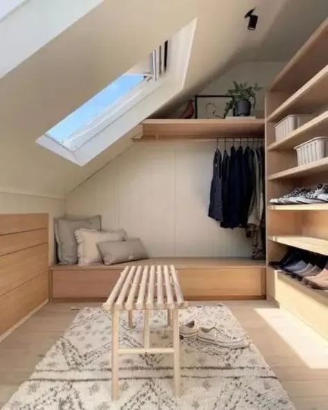 a tiny attic closet with open shoe shelves and a railing plus a storage daybed and a bench is a lovely space Attic Closet Ideas, Small Loft Spaces, Loft Conversion Bedroom, Attic Closet, Loft Storage, Loft Space, Small Loft, Daybed With Storage, Dressing Rooms