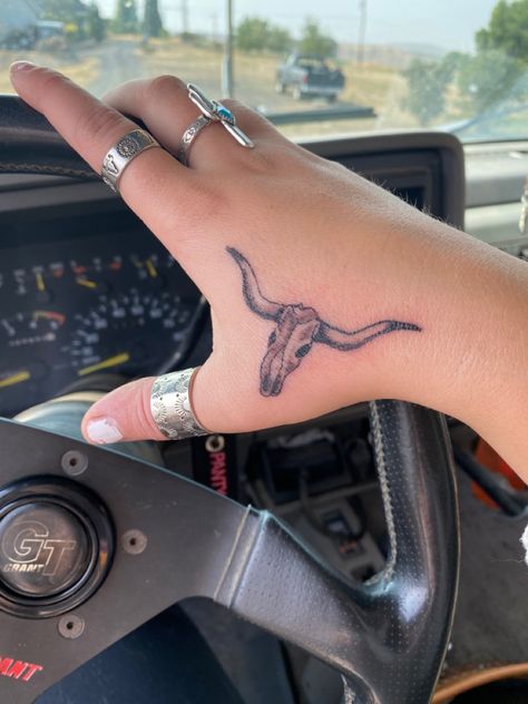 Small western tattoo, Hand tattoo, longhorn skull hand tattoo and Longhorn Skull Dream Catcher Tattoo, Western Tattoos Hand, Bull Tattoo On Hand, Longhorn Tattoo On Hand, Longhorn Tattoo Above Knee, Country Tattoos For Couples, Bull Hand Tattoo For Women, Matching Texas Tattoos, Longhorn Head Tattoo