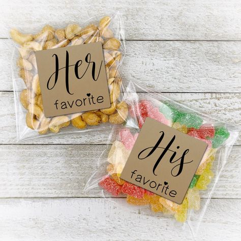 💕 More His and Hers Favorites from Clementine! www.etsy.com/shop/ClementineWeddings?section_id=10879128 PERFECT WAY TO SHARE YOUR FAVES FOR YOUR BIG DAY! Set of 20 His and Her Favorites favor packaging includes: 10 His Favorite stickers 10 Her Favorite stickers Add on: 20 self-sealing cellophane favor bags Coordinates with OUR FAVORITE set: https://etsy.me/2Ws95nc EASY - AFFORDABLE - FUN FAVOR GIVING Fill your favor bags with your faves: sweet, salty, sticky, you name it! Tag with His and Hers, and fold over to seal. Include in hotel welcome bags, wedding party baskets, shower favors or thank you gifts.  For custom text requests, please contact me before purchasing. CUSTOM DESIGNED FOR YOUR EVENT 2" square labels are available in Matte White. "His" and "Hers" are printed in elegant modern Hotel Room Gifts For Wedding Guests, Wedding Favors His And Her Favorite, California Wedding Favors, Wedding Guests Favors Ideas, Welcome Wedding Party Ideas, Bridal Shower Goody Bags, Party Favor Wedding Ideas, His And Hers Snacks Wedding, Cute Wedding Party Favors