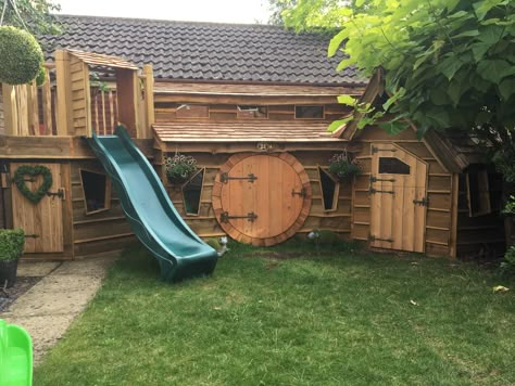 Hobbit Tree House, Backyard Hobbit House, Playhouse Flooring Ideas, Hobbit Playhouse Diy, Castle Playhouse Outdoor, Hobbit Hole Playhouse Diy, Shire Playhouse, Backyard Castle Playhouse, Hobbit Playhouse