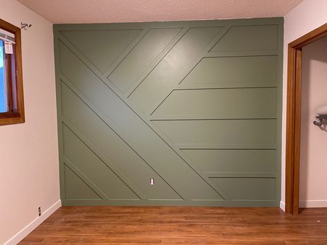 Sage Green accent wall made with pack of 10 base boards Olive Shiplap Wall, Soft Green Accent Wall, Laurel Tree Behr Paint, Sage Shiplap, Board And Batten Wall Green, Behr Laurel Tree, Light Green Accent Wall, Olive Green Accent Wall, Mint Green Walls