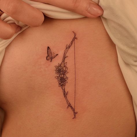 Mockingjay Tattoo, Chest Tattoo Designs Female, Chest Tattoo Drawings, Flower Tattoo On Ribs, Sagittarius Tattoo Designs, Lotr Tattoo, Small Chest Tattoos, Sagittarius Tattoo, Fantasy Tattoos