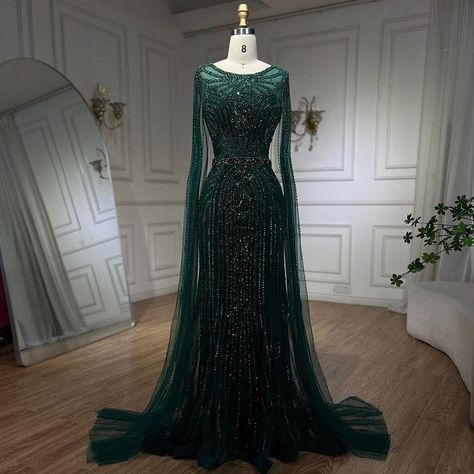 Be the highlight of the night.💚 Illuminate at www.larosabride.com #NightHighlight #IlluminatedElegance #larosabride Gown With Cape, Beaded Cape, Mermaid Evening Dress, Mermaid Evening Gown, Black Mermaid, Green Mermaid, Cape Sleeves, Mermaid Silhouette, Feather Dress