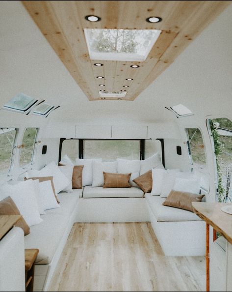 11 Wow-Worthy Airstream Remodels | RV Inspiration Rv Skirting, Rv Wallpaper, Airstream Living, Rv Inspiration, Built In Couch, Airstream Remodel, Airstream Interior, Airstream Renovation, Diy Camper Remodel