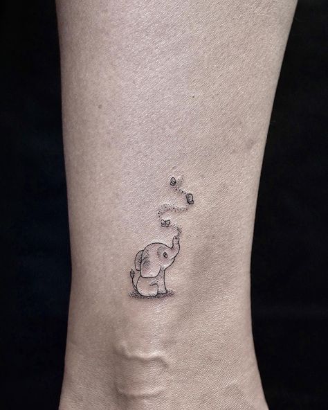 Tiny Elephant Tattoos For Women, Elephant Tattoos With Butterflies, Line Work Elephant Tattoo, 2 Elephants Tattoo, Dainty Wolf Tattoo, Elephant Fine Line Tattoo, Fine Line Elephant Tattoo, Small Elephant Tattoos, Elephant Tattoos With Flowers