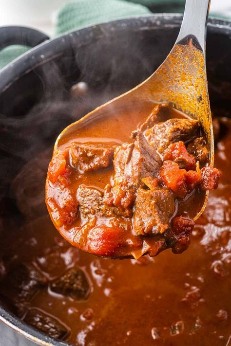 This texas chili recipe will be a crowd pleasing favorite! Tender stew meat cooked with smoky, savory spices, without beans is delicious and easy to make. Chili Recipe Using Stew Meat, Chili Recipe Texas Style, Beef Chili Without Beans, Beef Cube Chili Recipe, Beef Stew Chili Recipe Crockpot, Beef Tips Chili Recipe, Beef Chili Recipe No Beans, Cubed Beef Chili, Texas Chili With Stew Meat