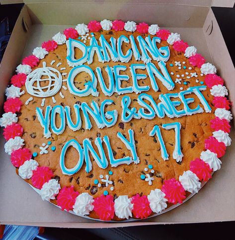 Cookie cake from Great American Cookie that says “Dancing queen young & sweet only 17” with sparkles and disco balls around Dancing Queen Birthday Party Ideas, Dancing Queen Cookies, Dancing Queen 17th Birthday Party, Dancing Queen 17 Cookies, Western Cookie Cake, Dancing Queen Only 17 Cake, 17 Birthday Cake Dancing Queen, 16th Birthday Cookie Cake, Dancing Queen Young And Sweet Only 17