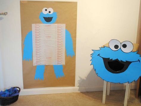 Levi's Cookie Monster 2nd Birthday | CatchMyParty.com Cookie Monster Party Decorations Diy, Cookie Monster Games, Cookie Monster Party Decorations, Monster Birthday Party Ideas, 1st Birthday Party Games, Cookie Monster Birthday Party, Toddler Party Games, Monster Birthday Party, Cookie Monster Party