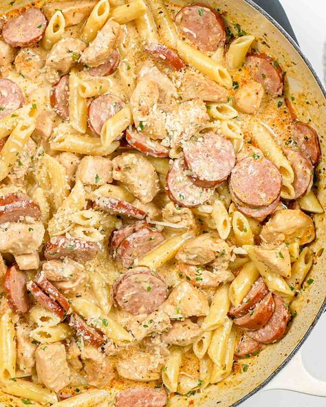 This is the best Cajun Chicken Pasta recipe! It's creamy, cheesy, loaded with flavor, and on the table in 30 minutes! An easy weeknight dinner your whole family will love. #cajunchickenpasta #cajunchicken #recipe Zydeco Pasta Recipe, Recipes With Cavatappi Pasta, Cajun Tortellini Pasta, Dinner Recipes Kielbasa, Dinner For A Crowd Families, Jo Cooks Recipes, Cajun Chicken Pasta With Sausage, Cajun Pasta With Sausage, Chicken And Sausage Pasta