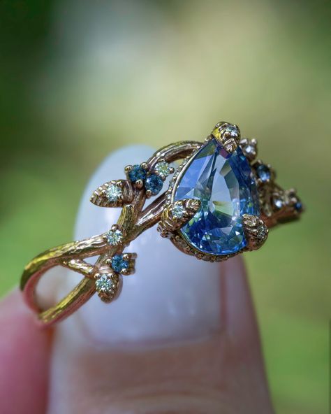 Nature Inspired Pastel Blue Sapphire Leaf Engagement Ring 14K Gold – Albrecht Jewellery Wedding Ring Combinations, Rings Aesthetic Engagement, Sapphire Aesthetic, Color Stone Rings, Fairy Engagement Ring, Fairy Nature, Blue Wedding Rings, Blue Diamond Engagement Ring, Montana Sapphire Ring