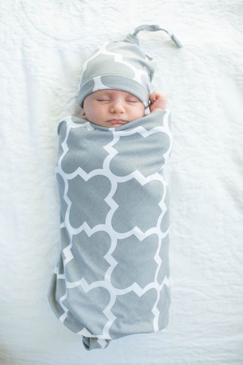 "Ready To Ship! 2 Piece set includes: 1 Baby Blanket 1 Newborn Hat This listing does not include the matching mommy robe Looking for matching mommy wear? Click on our store to find matching labor gowns, nightgowns, robes and more. Created using a super soft material combination of cotton/elasthane, this swaddle blanket and knotted hat set is the perfect gift for any newborn. Swaddle your infant gently to mimic your own warm embrace and encourage sound, restful sleep. The swaddle blanket measures Newborn Clothes Checklist, Gender Neutral Baby Shower Gifts, Newborn Swaddle Blanket, Material Combination, Disney Baby Clothes, Baby Swaddle Blanket, Trend Clothes, Newborn Swaddle, Lightweight Blanket