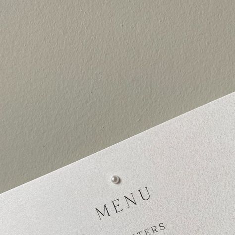 Megan | Wedding & Event Stationery + Branding on Instagram: "simple, timeless + elegant ✨  Featuring our pearl paper along with a little pearl to enhance the elegance of the menu for our bride & groom to be E&J.  ~ ~ ~  #smallbusiness #elegant #minimalism #modern #menudesign #weddingstationery #pearlpaper #2025bride #classywedding" Minimalist Pearl White Pearl Drop Bridal Earrings, Luxury Minimalist Pearl White Pearl Earrings, Classy Wedding Menu Design, Wedding Invitation Pearls, Pearl Wedding Invitations, Groom To Be, Event Stationery, Elegant Minimalism, Wedding Black