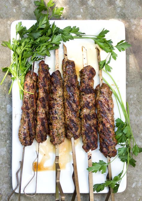 Every Middle Eastern country has a version of grilled Kofta Kebabs. It's hard to imagine anything more delicious! Especially with garlicky yogurt sauce! This recipe shows you how to make authentic Grilled Turkish Kofta Kebabs at home. #Kofta #Kebabs #TurkishBBQ Turkish Kofta, Turkish Spices, Fruit Kebabs, Doner Kebab, Kebab Recipes, Eastern Cuisine, Yogurt Sauce, Lamb Recipes, Kebabs